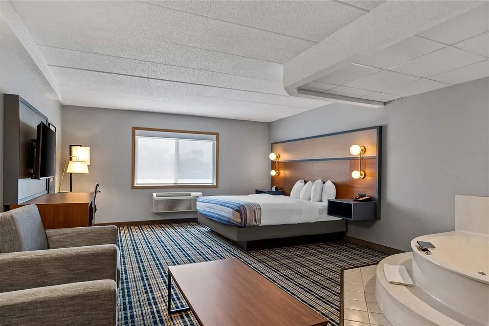 AmericInn by Wyndham guestroom with a full Nerval case goods package