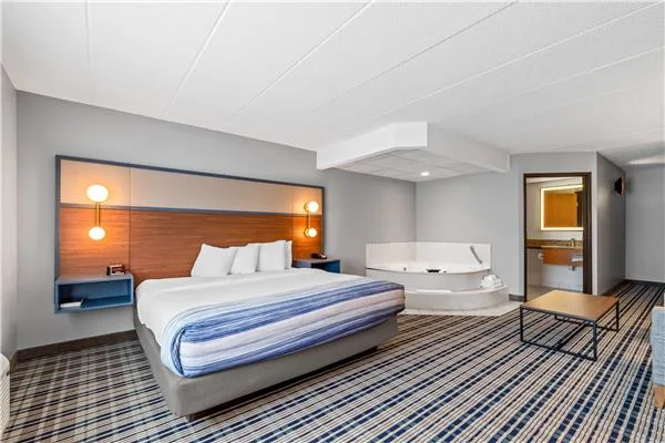 AmericInn by Wyndham Crookston — king guestroom