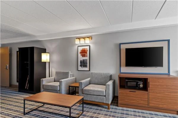 AmericInn by Wyndham Crookston — side table, coffee table and TV unit