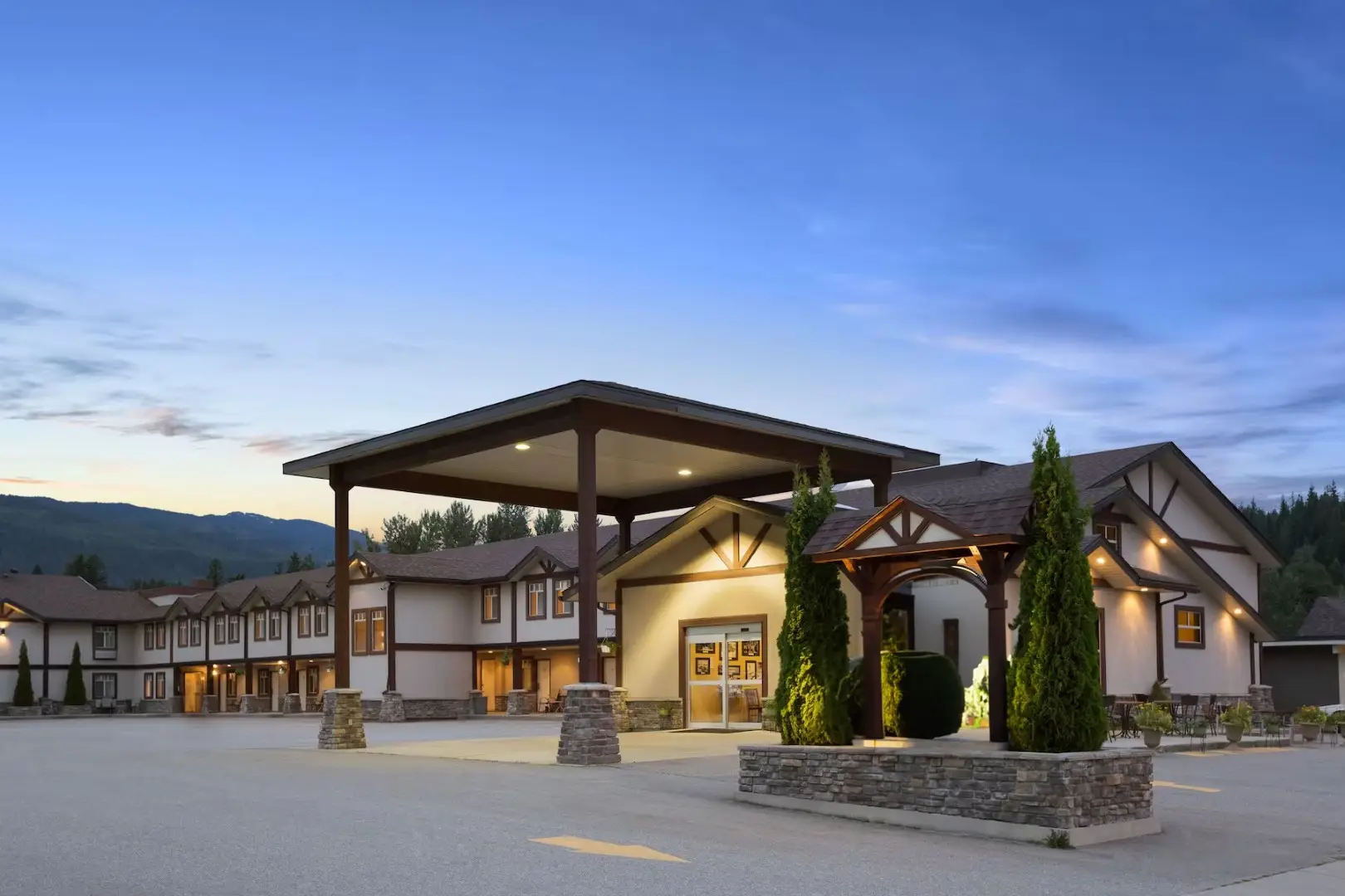 Northwinds Hotel — mountain-lodge boutique hotel exterior in Revelstoke at dusk