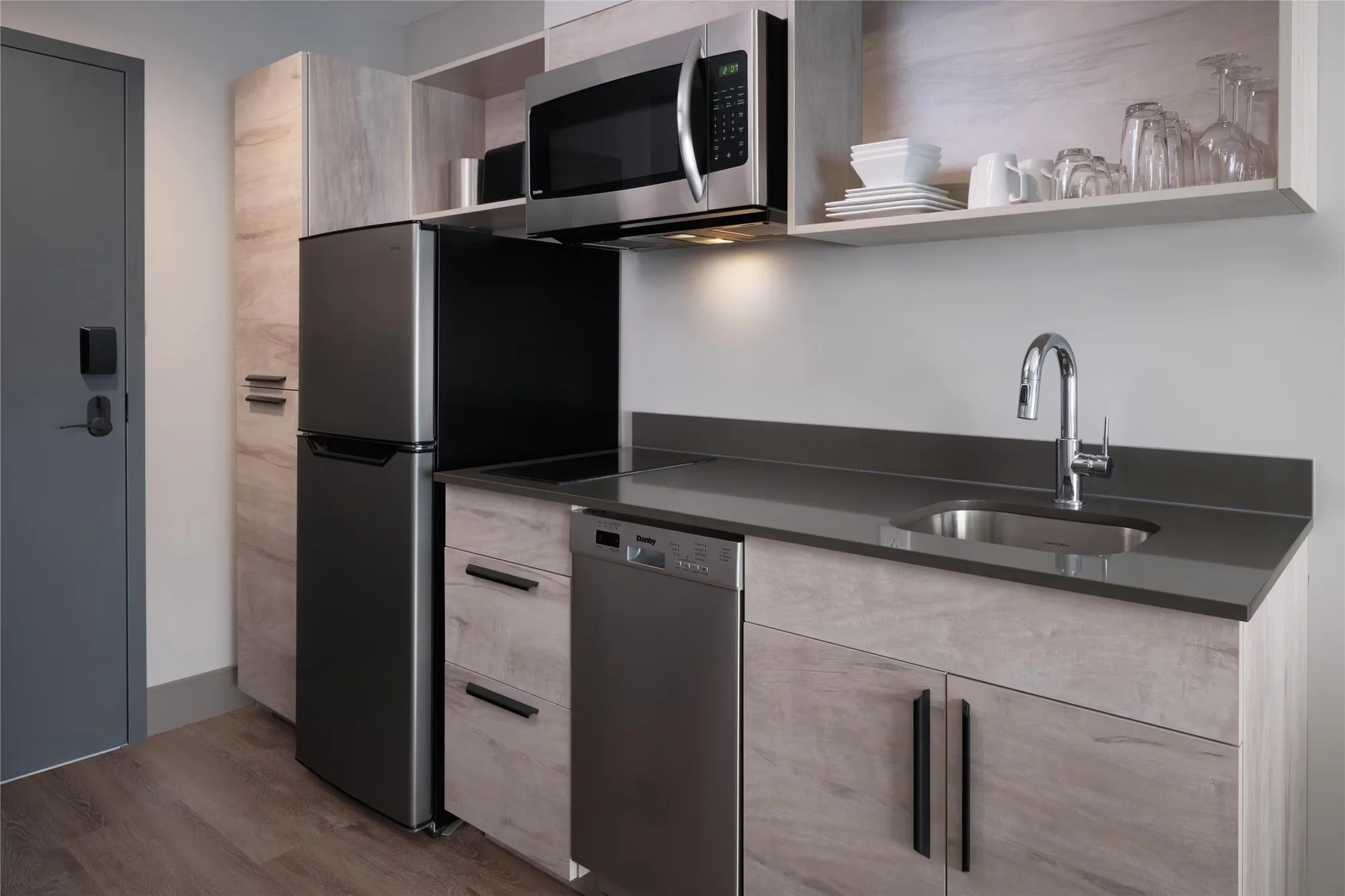 Extended stay guestroom with durable Nerval FF&E