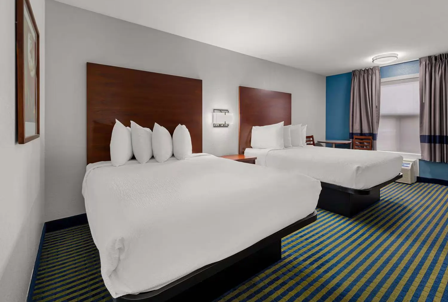 SureStay Plus by Best Western guestroom — SureStay Plus by Best Western Coquitlam, BC · Platform Bed Bases