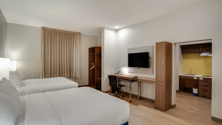 MainStay Suites double-queen suite furnished by Nerval