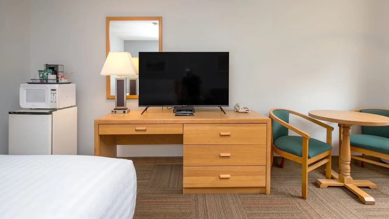 Coast Hotels guestroom — Coast Hinton Hotel, Hinton AB · Desk, Dresser & Seating